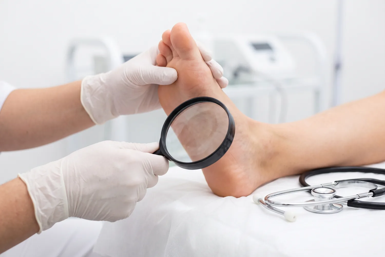 Dermatology exam of skin with a magnifier